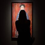 Gallery Figure with Her Back Turned Breaks Silence