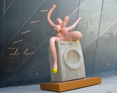 Intriguing Sculpture Debuts Outside New Museum Featuring a Playful Nude Figure