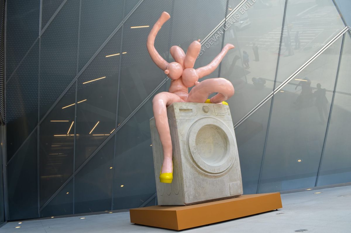 Intriguing Sculpture Debuts Outside New Museum Featuring a Playful Nude Figure